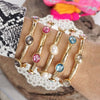 Jeweled Golden Bangle - with Faceted glass oval colorful jewels: Multi-Colored